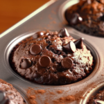 Freshly baked double chocolate chip muffin recipe, loaded with rich chocolate chips and a perfectly cracked top.